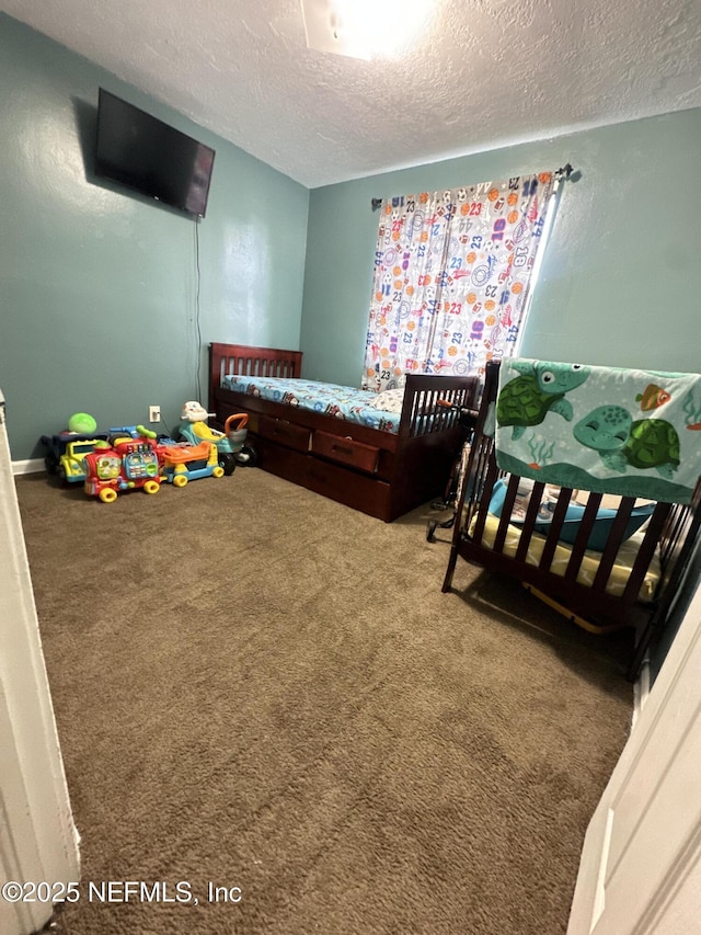 6316 Pine Summit Dr, Jacksonville, FL 32211 - bedroom featuring a textured ceiling and carpet