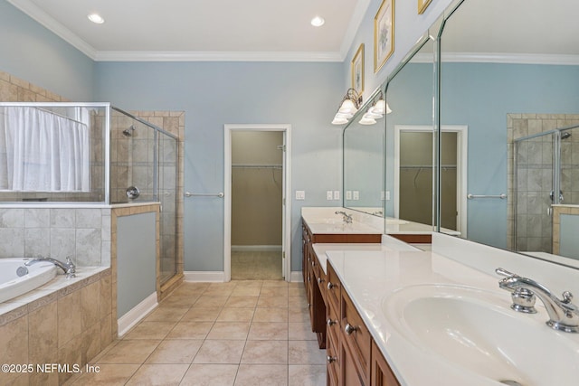 4640 Tuscan Wood Ct, Saint Augustine, FL 32092 - bathroom with vanity, a stall shower, a bath, a spacious closet, and crown molding