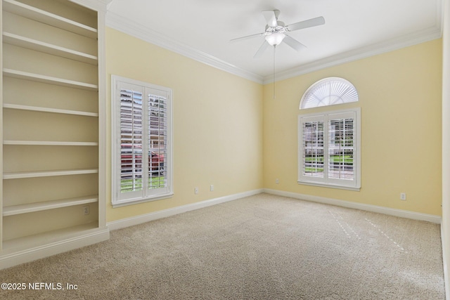 4640 Tuscan Wood Ct, Saint Augustine, FL 32092 - unfurnished room featuring ornamental molding, carpet flooring, a ceiling fan, and built in features