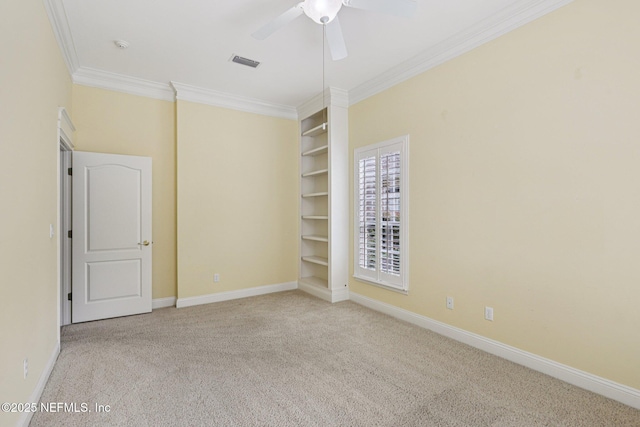 4640 Tuscan Wood Ct, Saint Augustine, FL 32092 - carpeted spare room featuring ornamental molding, ceiling fan, and built in shelves
