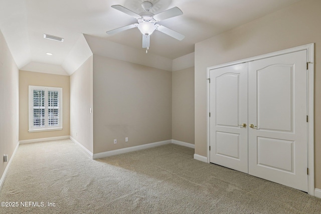 4640 Tuscan Wood Ct, Saint Augustine, FL 32092 - unfurnished bedroom with carpet flooring, ceiling fan, vaulted ceiling, and a closet