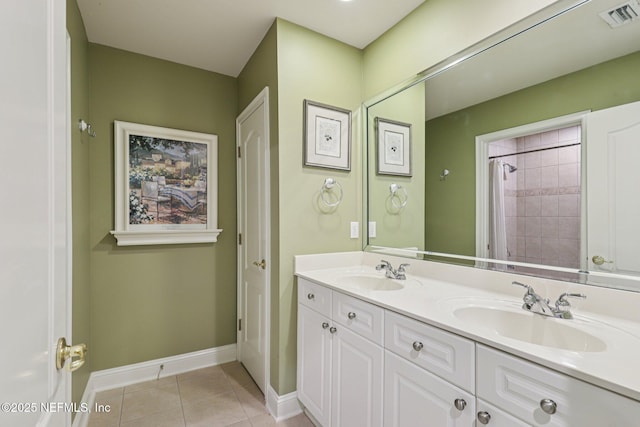 4640 Tuscan Wood Ct, Saint Augustine, FL 32092 - bathroom with double vanity, tile patterned floors, and curtained shower