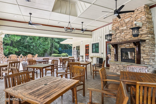 4640 Tuscan Wood Ct, Saint Augustine, FL 32092 - view of patio / terrace featuring ceiling fan, an outdoor stone fireplace, and outdoor dining space