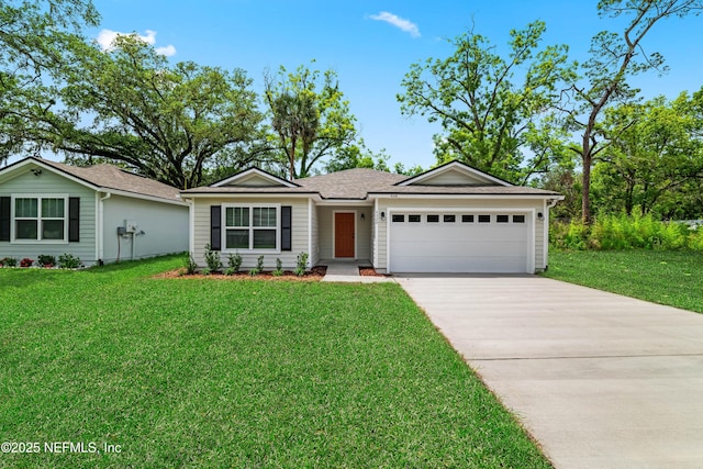 5969 Flicker Ave, Jacksonville, FL 32219 - single story home featuring a garage, concrete driveway, and a front yard