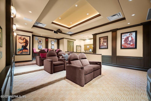 1031 1st St S Unit 1202, Jacksonville Beach, FL 32250 - cinema room with light colored carpet, ornamental molding, a tray ceiling, recessed lighting, and a decorative wall