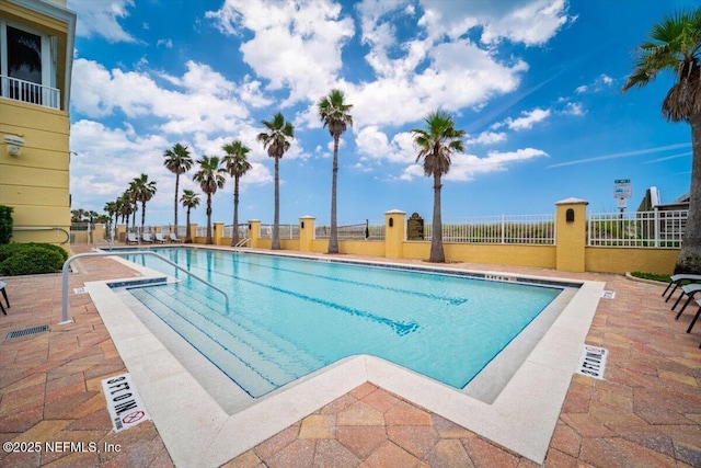 1031 1st St S Unit 1202, Jacksonville Beach, FL 32250 - community pool with a patio area