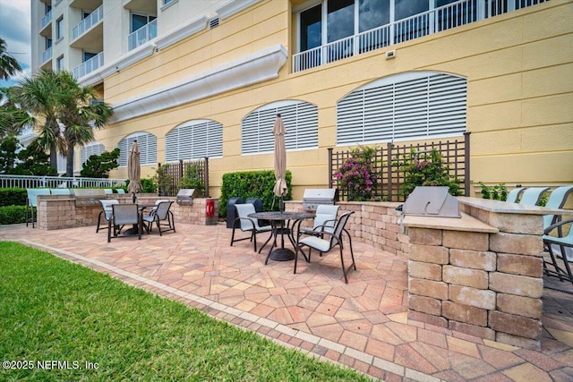 1031 1st St S Unit 1202, Jacksonville Beach, FL 32250 - view of patio / terrace featuring exterior bar