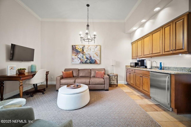 1031 1st St S Unit 1202, Jacksonville Beach, FL 32250 - living area featuring a chandelier, baseboards, and crown molding