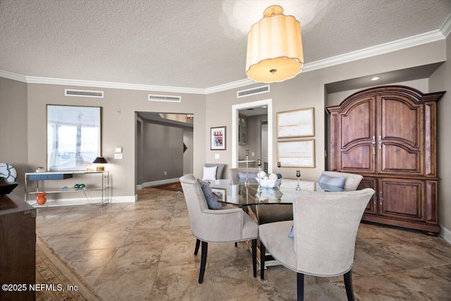 1031 1st St S Unit 1202, Jacksonville Beach, FL 32250 - dining space with a textured ceiling, ornamental molding, and baseboards