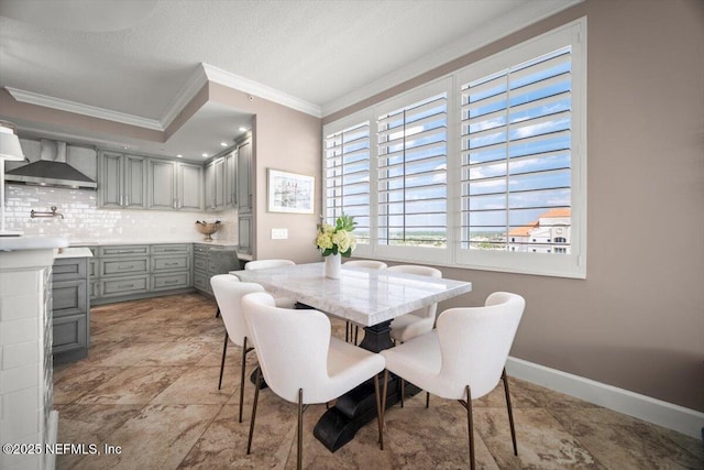 1031 1st St S Unit 1202, Jacksonville Beach, FL 32250 - dining room featuring crown molding and baseboards