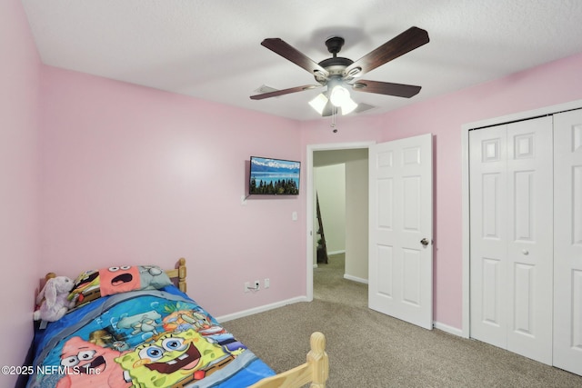 1260 Winding Brook Ct, Middleburg, FL 32068 - bedroom with carpet flooring, a closet, baseboards, and a ceiling fan