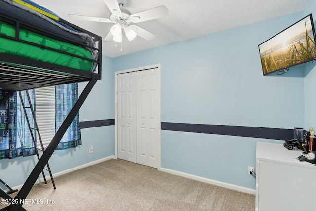 1260 Winding Brook Ct, Middleburg, FL 32068 - unfurnished bedroom with carpet, baseboards, a closet, and a ceiling fan