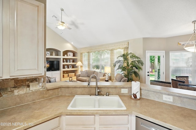 1077 Waterfall Dr, Jacksonville, FL 32225 - kitchen with a sink, open floor plan, a ceiling fan, lofted ceiling, and light countertops