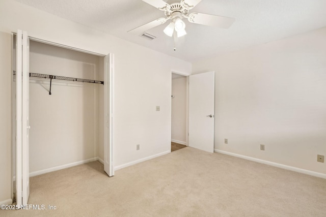 4580 Carolyn Cove Ln N, Jacksonville, FL 32258 - unfurnished bedroom with light carpet, a closet, a ceiling fan, and baseboards