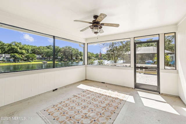 4580 Carolyn Cove Ln N, Jacksonville, FL 32258 - unfurnished sunroom featuring a ceiling fan, a water view, and plenty of natural light