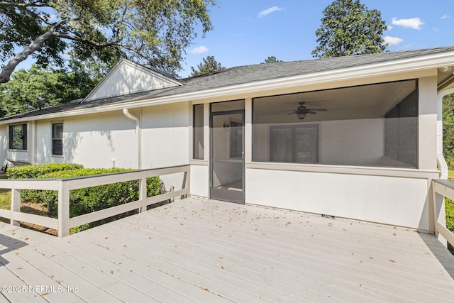 4580 Carolyn Cove Ln N, Jacksonville, FL 32258 - wooden deck with a sunroom and a ceiling fan