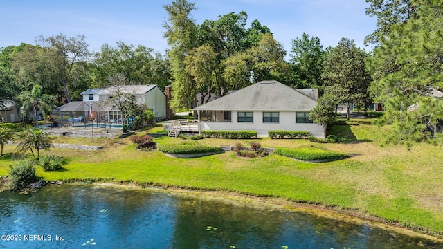4580 Carolyn Cove Ln N, Jacksonville, FL 32258 - back of property featuring a water view, a yard, an outdoor pool, and a lanai