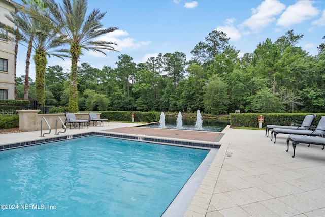 955 Registry Blvd Unit 306, Saint Augustine, FL 32092 - community pool featuring a patio area