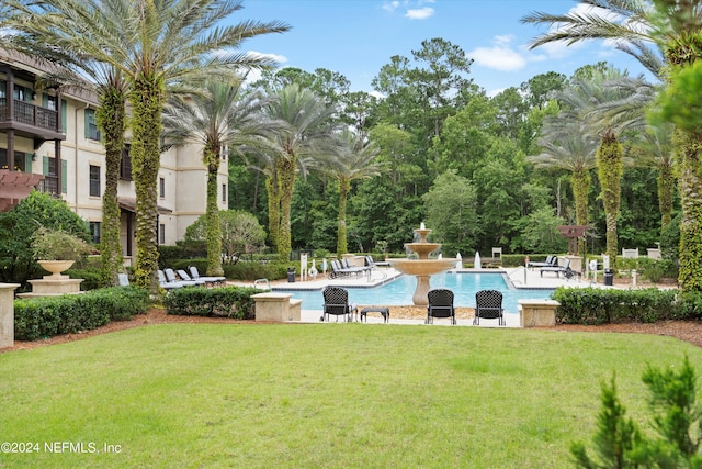 955 Registry Blvd Unit 306, Saint Augustine, FL 32092 - community pool featuring a lawn and a patio area