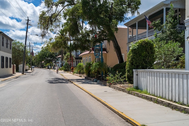 955 Registry Blvd Unit 306, Saint Augustine, FL 32092 - view of asphalt road with sidewalks, street lights, and curbs