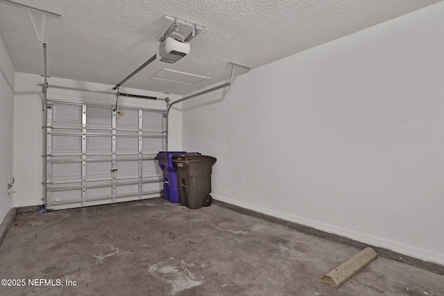 274 Syrah Way, Saint Augustine, FL 32084 - garage with baseboards and a garage door opener