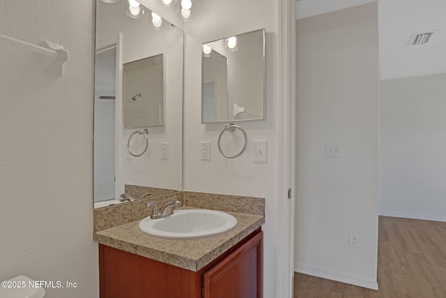 274 Syrah Way, Saint Augustine, FL 32084 - bathroom featuring vanity and wood finished floors