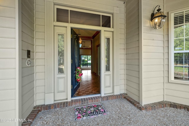 8127 Middle Fork Ln, Jacksonville, FL 32256 - view of exterior entry with a porch