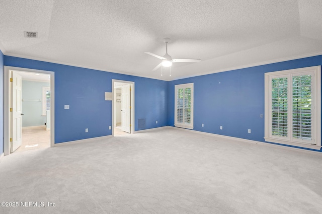 8127 Middle Fork Ln, Jacksonville, FL 32256 - unfurnished bedroom featuring a textured ceiling, crown molding, baseboards, carpet floors, and connected bathroom