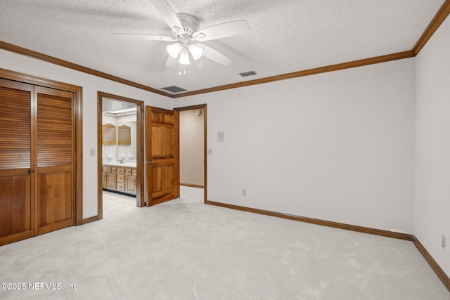 8127 Middle Fork Ln, Jacksonville, FL 32256 - unfurnished bedroom with light carpet, baseboards, a textured ceiling, a closet, and a ceiling fan