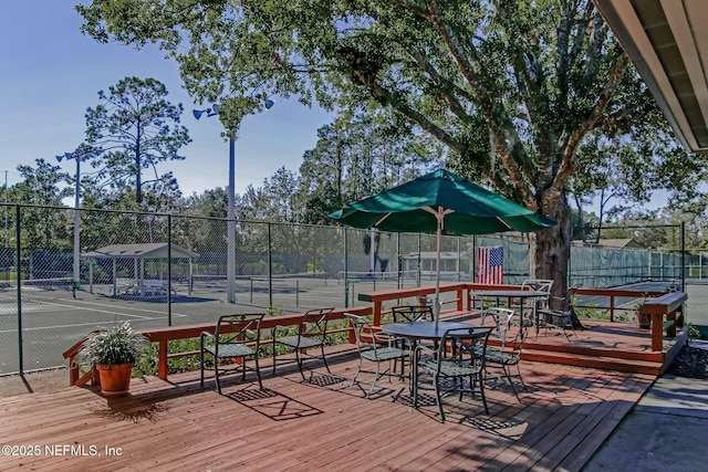 8127 Middle Fork Ln, Jacksonville, FL 32256 - deck with a tennis court and outdoor dining area