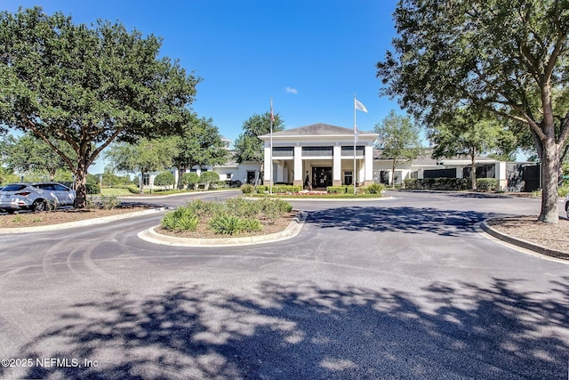8127 Middle Fork Ln, Jacksonville, FL 32256 - view of asphalt road featuring curbs