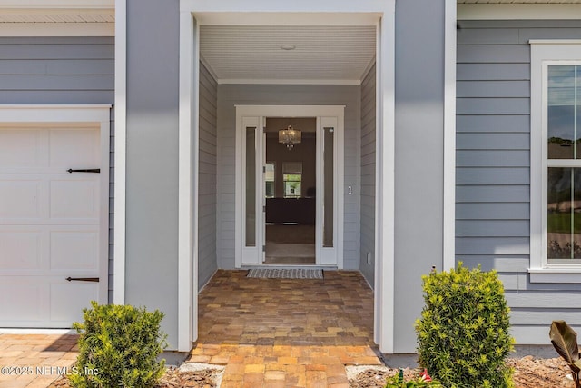 70 Pavo Cir, Saint Johns, FL 32259 - property entrance featuring covered porch and an attached garage