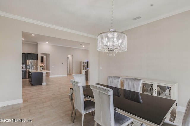 70 Pavo Cir, Saint Johns, FL 32259 - dining area featuring ornamental molding, light wood-style floors, a chandelier, baseboards, and recessed lighting