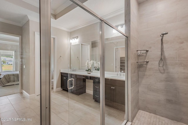70 Pavo Cir, Saint Johns, FL 32259 - full bathroom with crown molding, double vanity, ensuite bath, tiled shower, and tile patterned flooring