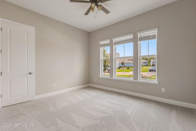 70 Pavo Cir, Saint Johns, FL 32259 - empty room with a ceiling fan, baseboards, and carpet flooring