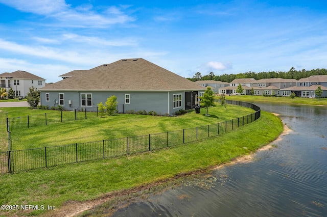 70 Pavo Cir, Saint Johns, FL 32259 - view of side of home with a residential view, a water view, and asphalt driveway