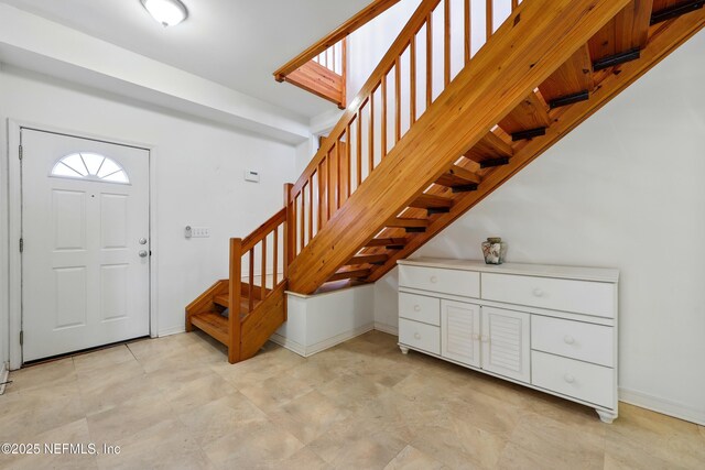 2605 S Ponte Vedra Blvd, Ponte Vedra Beach, FL 32082 - entryway featuring stairway and baseboards