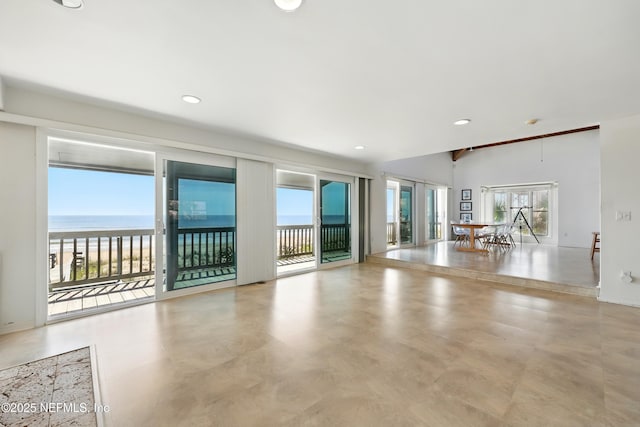 2605 S Ponte Vedra Blvd, Ponte Vedra Beach, FL 32082 - unfurnished living room with recessed lighting, a water view, and baseboards