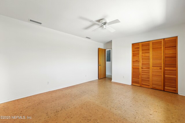 2605 S Ponte Vedra Blvd, Ponte Vedra Beach, FL 32082 - unfurnished bedroom featuring baseboards, a closet, and a ceiling fan