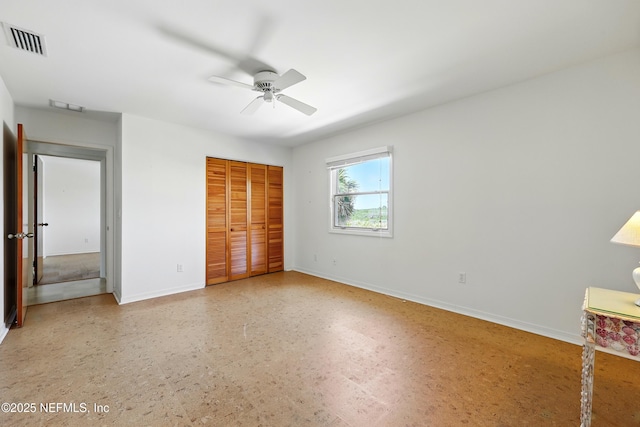 2605 S Ponte Vedra Blvd, Ponte Vedra Beach, FL 32082 - unfurnished bedroom featuring baseboards, a closet, and a ceiling fan