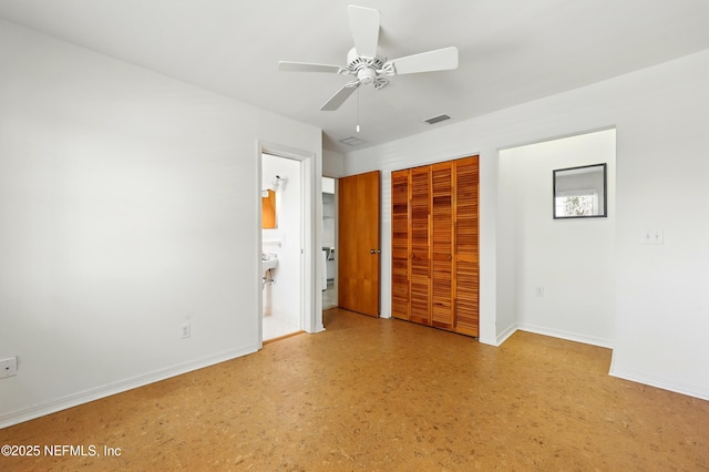 2605 S Ponte Vedra Blvd, Ponte Vedra Beach, FL 32082 - unfurnished bedroom featuring baseboards, a closet, ensuite bath, and ceiling fan