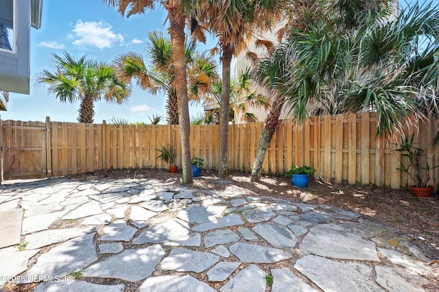 2605 S Ponte Vedra Blvd, Ponte Vedra Beach, FL 32082 - fenced backyard with a patio area