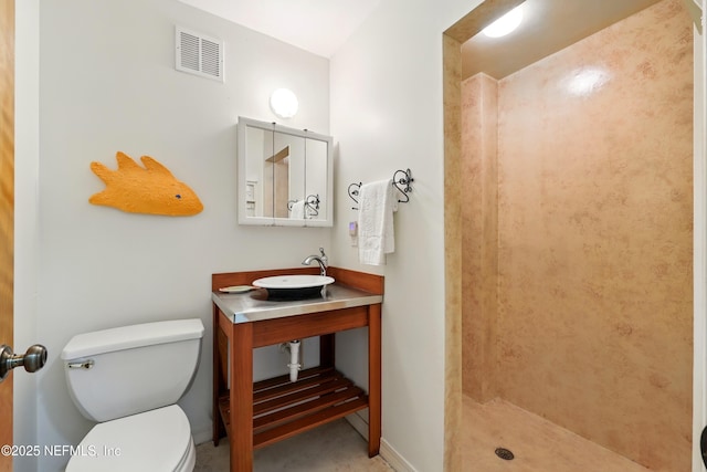 2605 S Ponte Vedra Blvd, Ponte Vedra Beach, FL 32082 - full bathroom featuring tiled shower, toilet, a sink, and baseboards