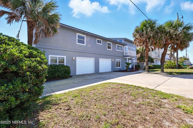 2605 S Ponte Vedra Blvd, Ponte Vedra Beach, FL 32082 - view of front of home featuring driveway and a garage