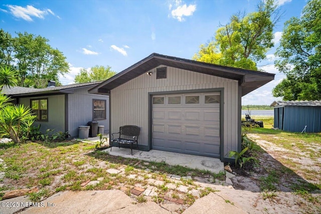 153 Jaffa Rd, Crescent City, FL 32112 - view of front facade featuring a garage
