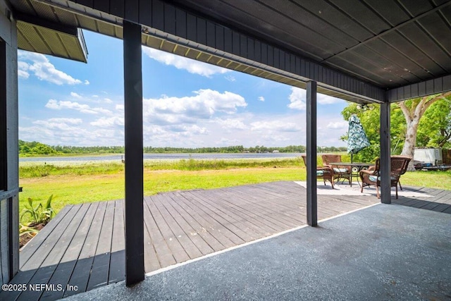153 Jaffa Rd, Crescent City, FL 32112 - deck with outdoor dining area and a lawn