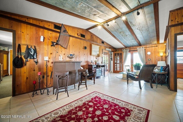 153 Jaffa Rd, Crescent City, FL 32112 - tiled living room featuring healthy amount of natural light, wooden walls, and french doors