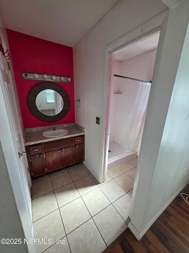 2 Bonita Dr, Ponte Vedra Beach, FL 32082 - bathroom featuring a stall shower, vanity, and tile patterned flooring