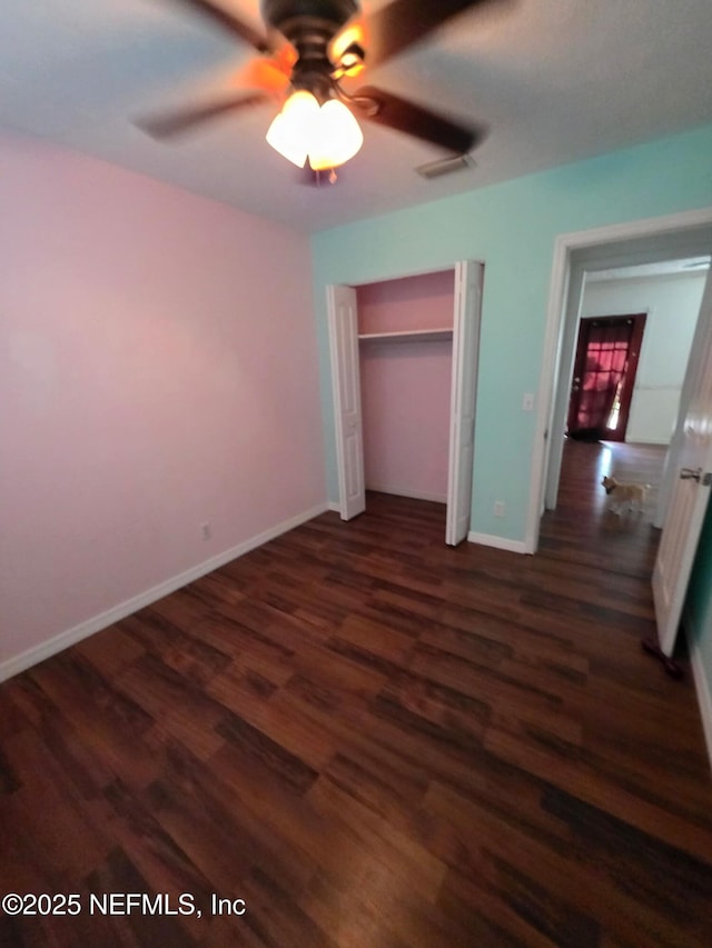 2 Bonita Dr, Ponte Vedra Beach, FL 32082 - unfurnished bedroom with wood finished floors, a closet, and a ceiling fan
