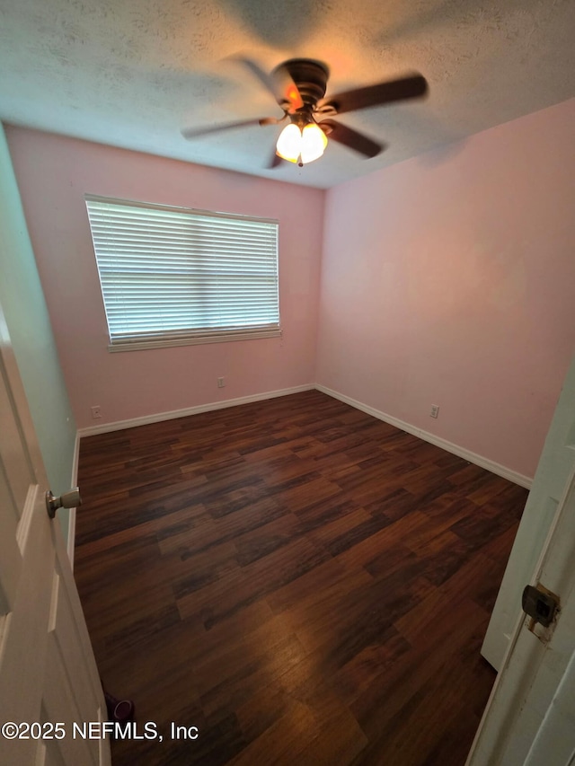 2 Bonita Dr, Ponte Vedra Beach, FL 32082 - spare room with ceiling fan, a textured ceiling, and dark wood-style flooring